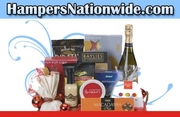 Hamper complementing delicacy with cuddling toys